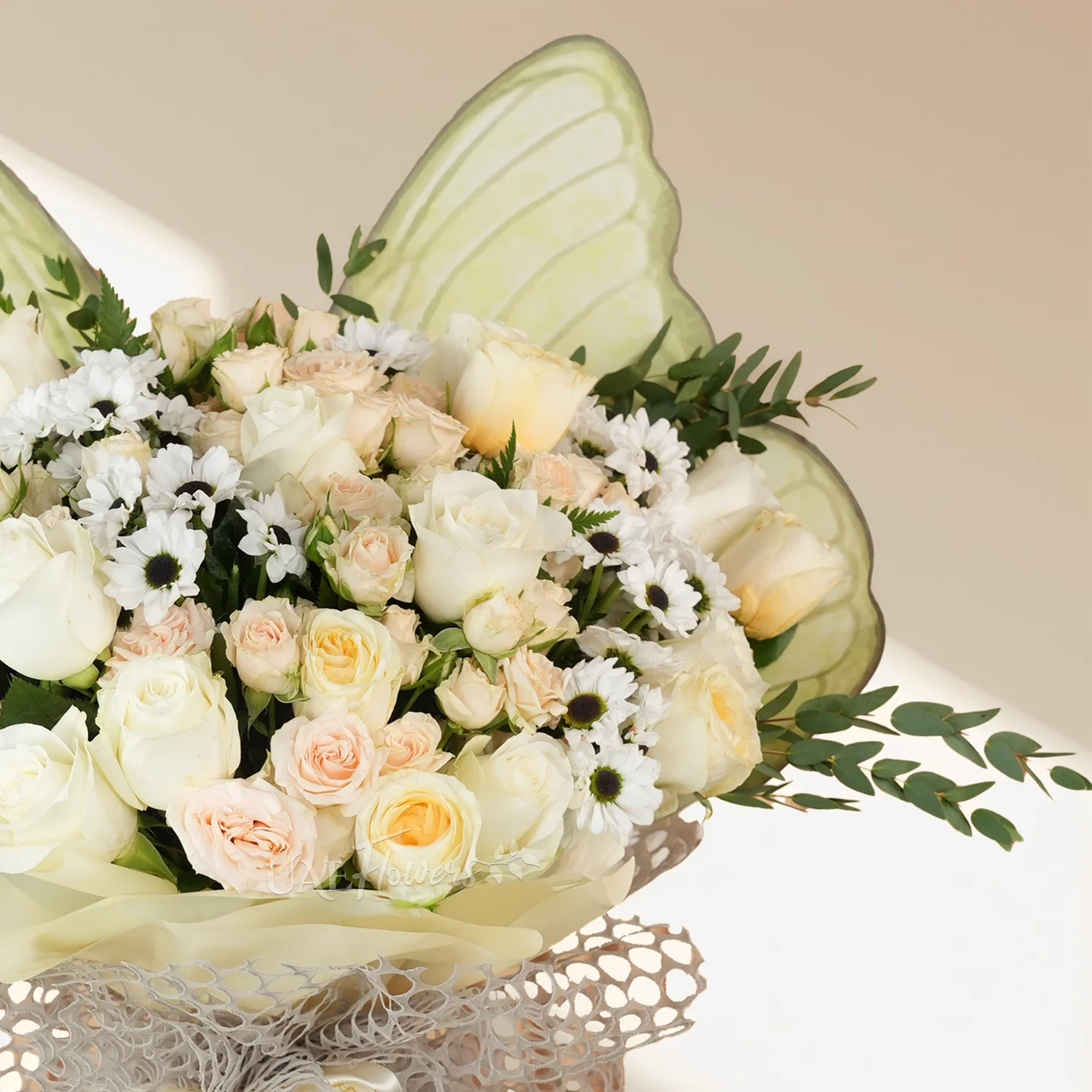 butterfly-shaped bouquet with 8 white roses, 8 pink roses, 4 pink gerberas