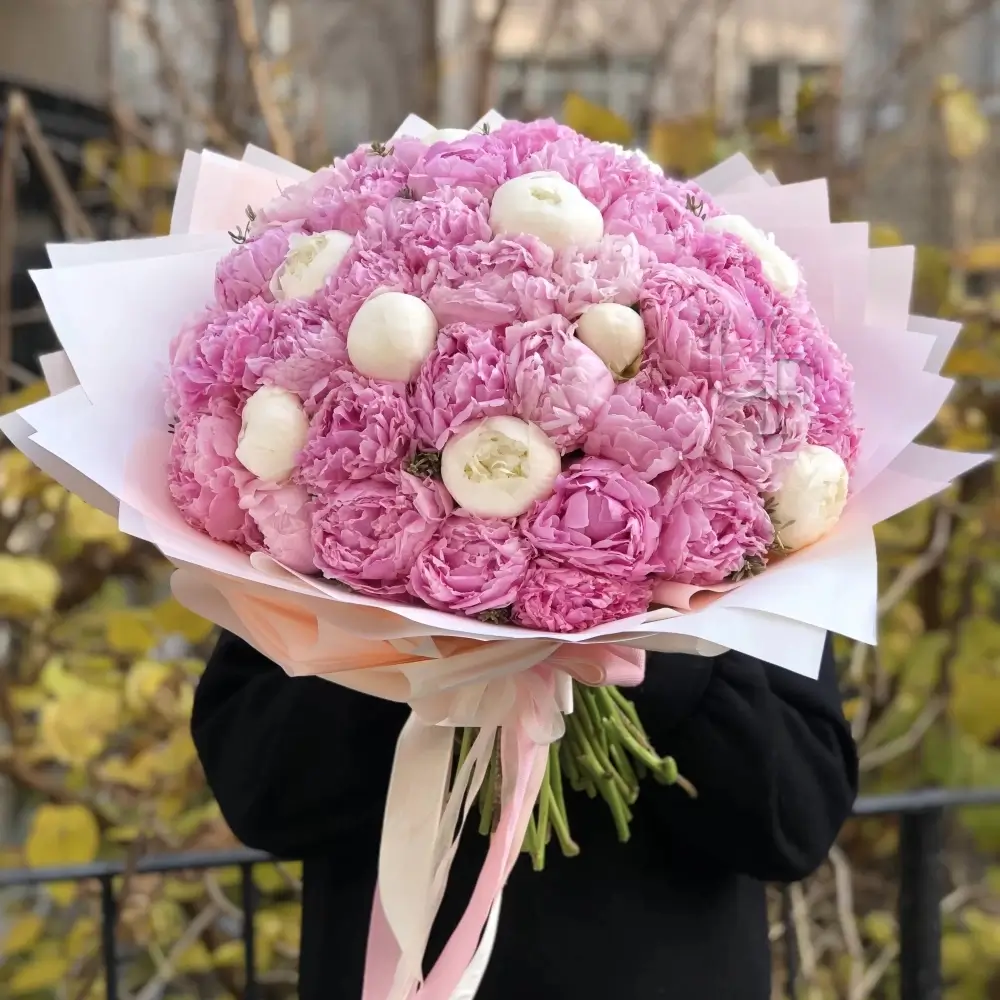 10 white and 40 pink peonies, wrapped in pink paper with matching ribbons