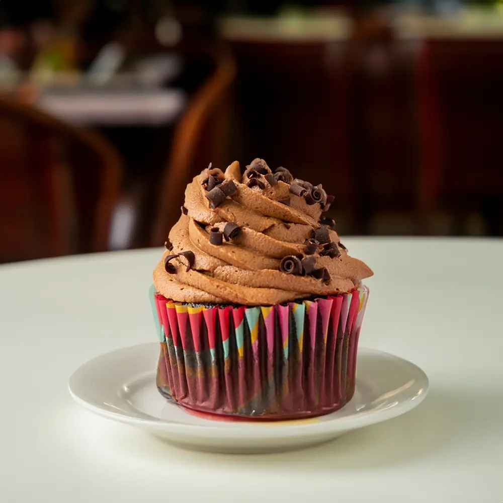 6 chocolate cupcakes topped with creamy rich chocolate frosting