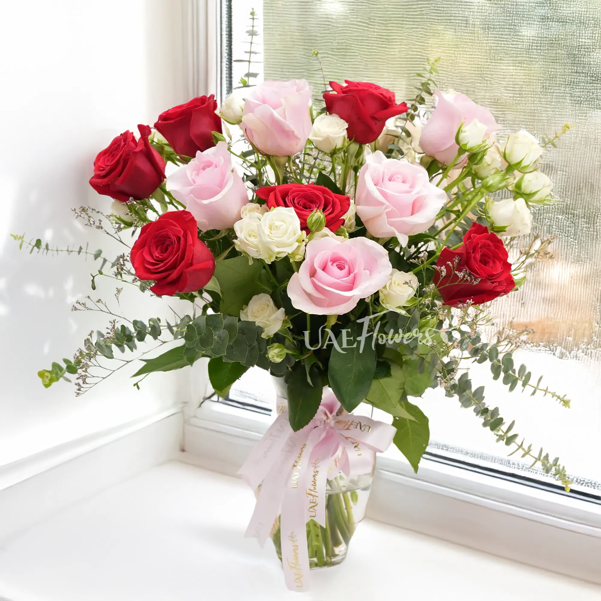 red and pink roses,  white spray roses
